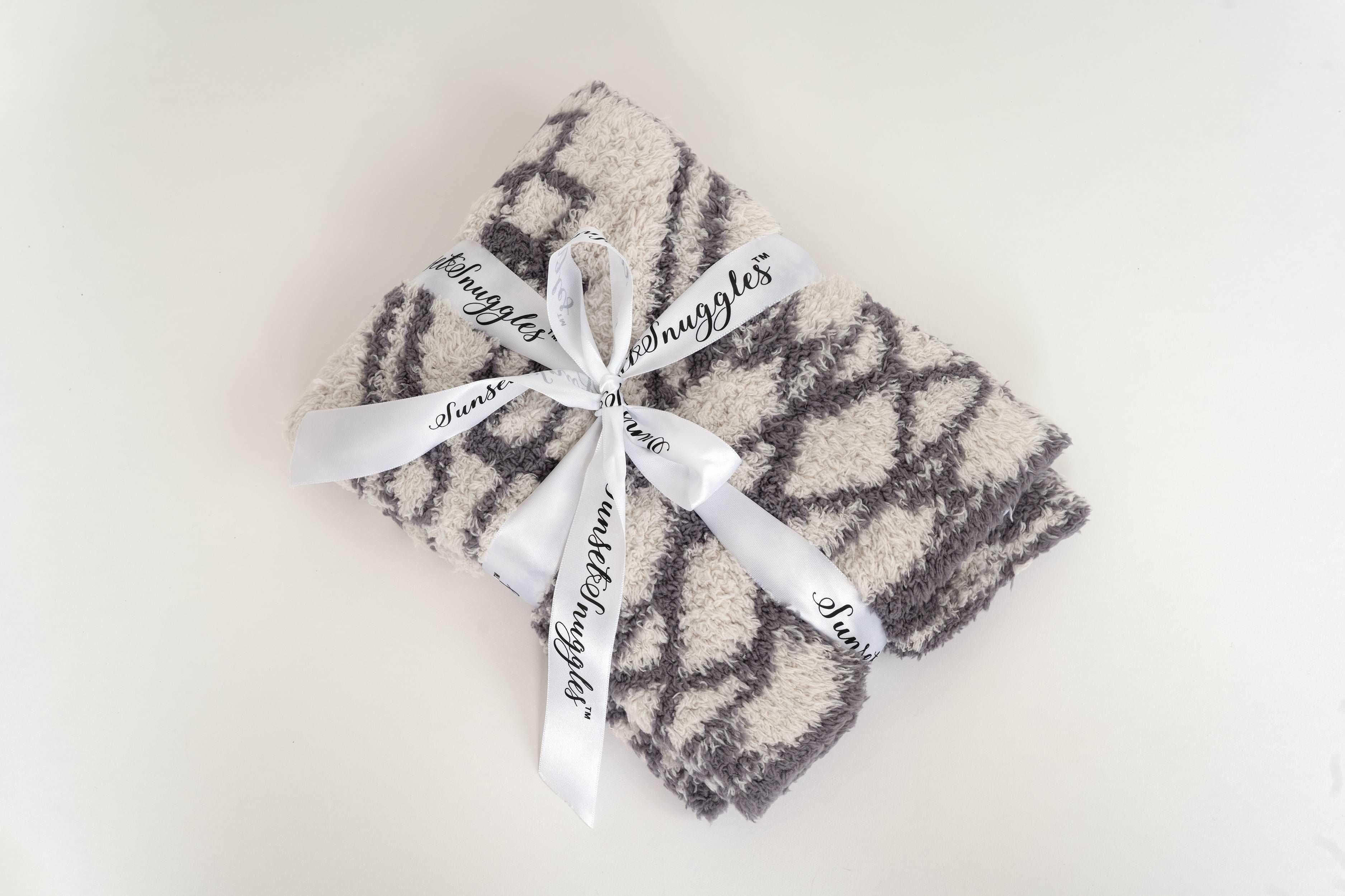 baby blanket in diamond tile baby's  breath and volcanic glass blanket