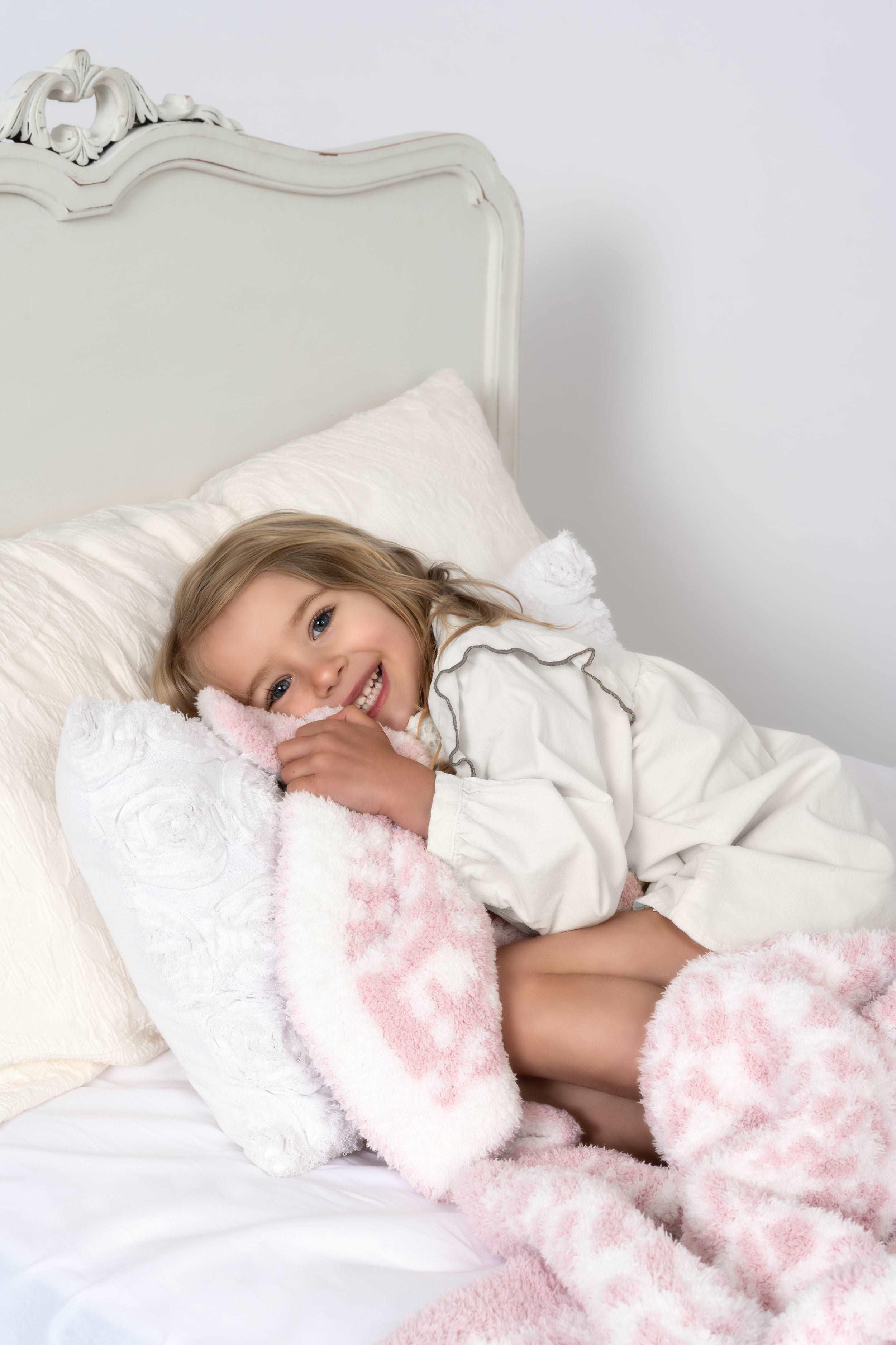 leopard print rose pink and white twin bed blanket with little girl