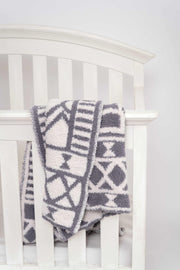 diamond tile baby's breath volcanic glass toddler blanket on a crib