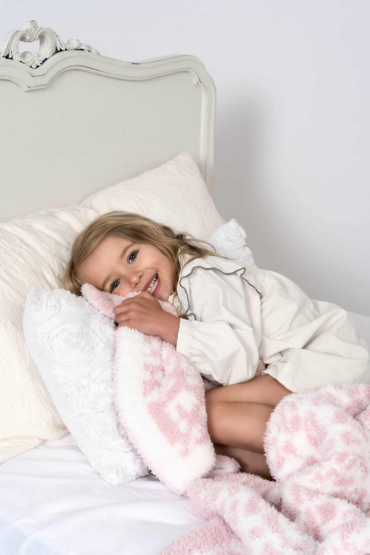 leopard print rose pink and white twin bed blanket with little girl