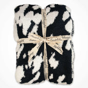 black and white cow print cowboy souther blanket plush and trendy